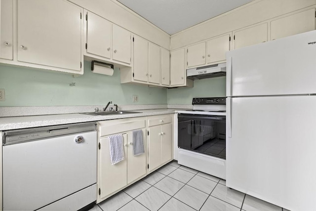 253 Rock St Unit 253, Norwood, MA 02062 - kitchen with white appliances, under cabinet range hood, light countertops, and light tile patterned flooring