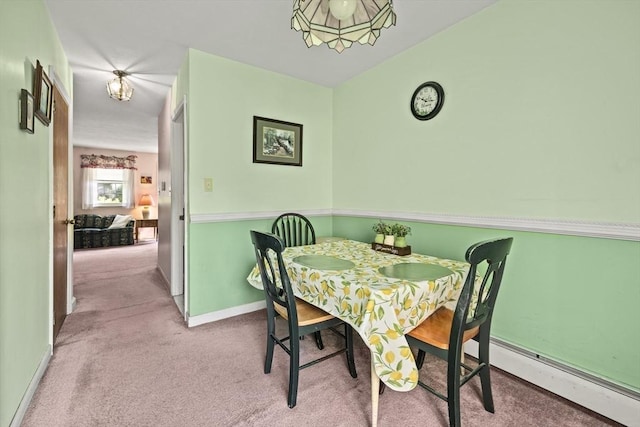 253 Rock St Unit 253, Norwood, MA 02062 - carpeted dining area featuring a baseboard heating unit and baseboards