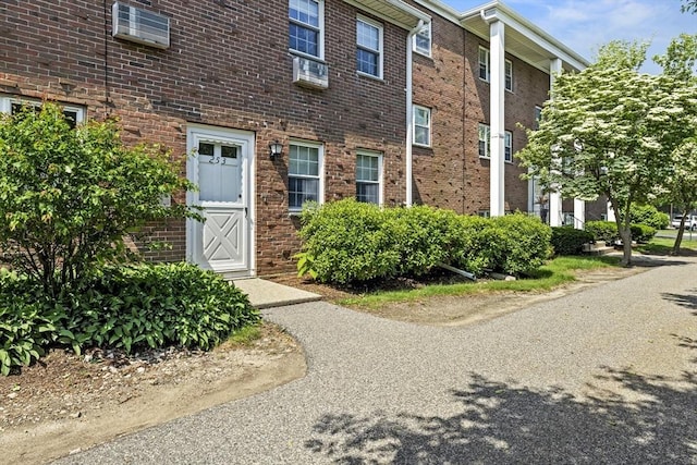 253 Rock St Unit 253, Norwood, MA 02062 - entrance to property with brick siding