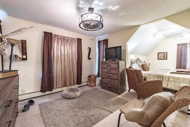 carpeted bedroom featuring a textured ceiling and a baseboard heating unit