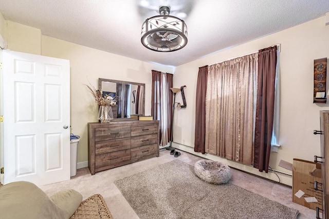 bedroom featuring light carpet