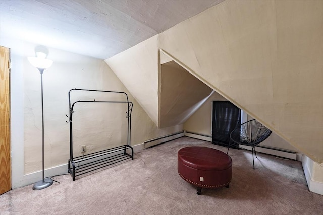 bonus room with lofted ceiling, a baseboard heating unit, and carpet