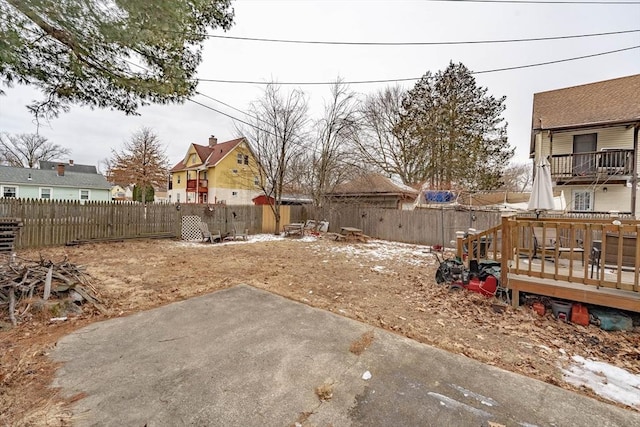 view of yard with a patio and a deck