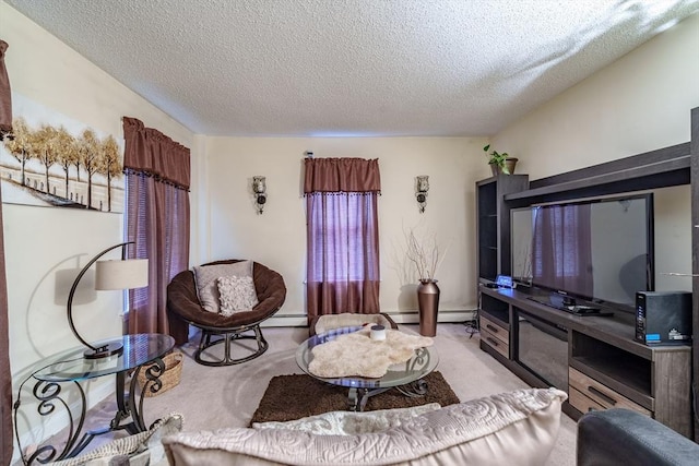 living room with baseboard heating, light carpet, and a textured ceiling