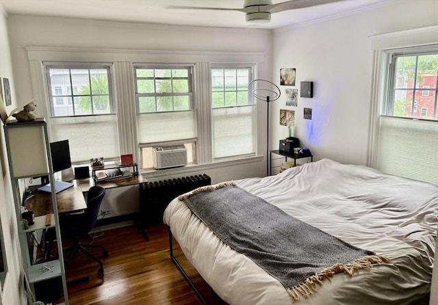 75 Rossmore Rd Unit 5, Boston, MA 02130 - bedroom featuring cooling unit, dark wood finished floors, ornamental molding, and a desk