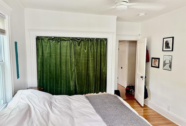 75 Rossmore Rd Unit 5, Boston, MA 02130 - bedroom with light wood-type flooring and crown molding