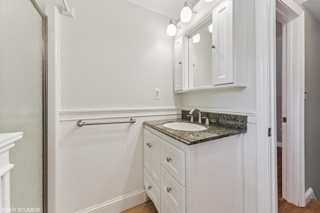 591 Poplar St, Boston, MA 02131 - bathroom with vanity, crown molding, and wood finished floors