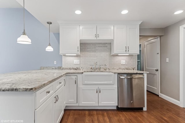 591 Poplar St, Boston, MA 02131 - kitchen with stainless steel dishwasher, dark wood-style flooring, white cabinets, a sink, and a peninsula