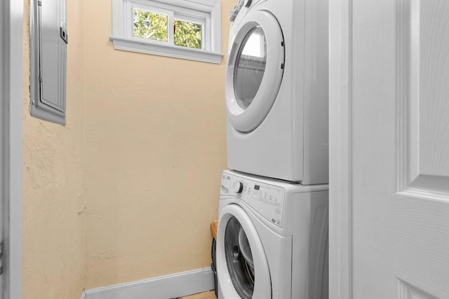41 Standish St Unit 3, Boston, MA 02124 - laundry area with estacked washer and dryer and baseboards