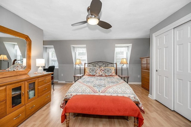 718 Wellman Ave Unit 718, Chelmsford, MA 01863 - bedroom with light wood-style flooring, baseboards, a ceiling fan, and a closet