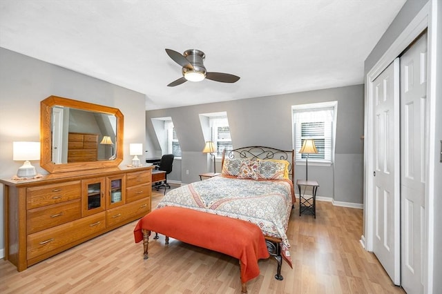 718 Wellman Ave Unit 718, Chelmsford, MA 01863 - bedroom featuring light wood-style flooring, baseboards, an office area, a closet, and ceiling fan