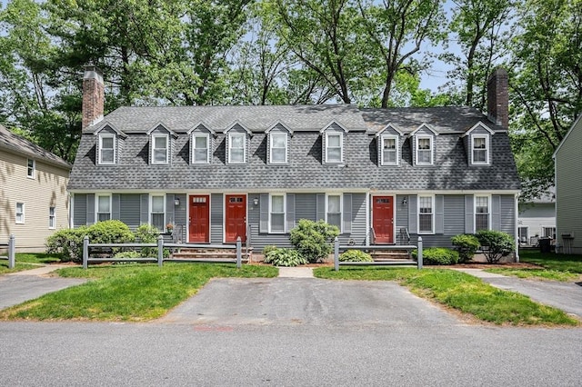718 Wellman Ave Unit 718, Chelmsford, MA 01863 - view of front of home featuring a chimney