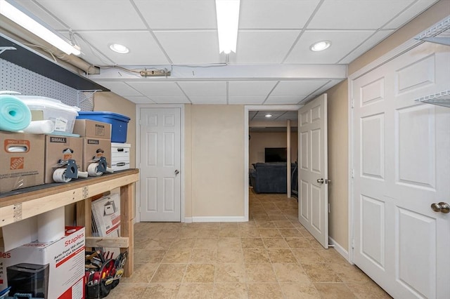718 Wellman Ave Unit 718, Chelmsford, MA 01863 - finished basement with a paneled ceiling, baseboards, and recessed lighting