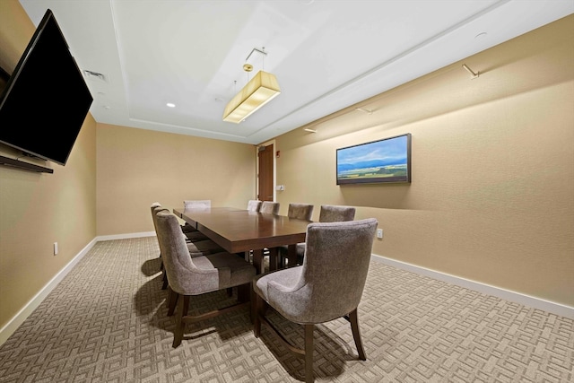 view of carpeted dining space