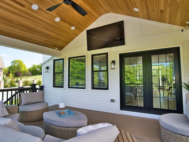 50 Bentley Ln, Westport, MA 02790 - wooden deck with french doors and ceiling fan