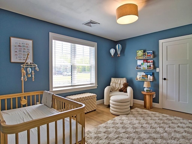 50 Bentley Ln, Westport, MA 02790 - bedroom with wood finished floors and baseboards