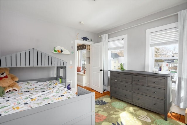 bedroom featuring light wood-type flooring