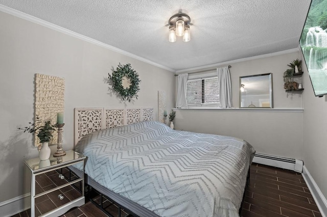 bedroom featuring baseboard heating, crown molding, and a textured ceiling