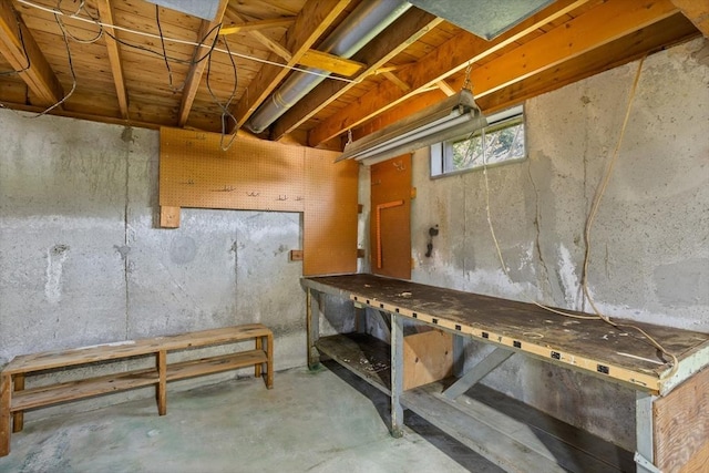 16 Winding Ln, Lowell, MA 01852 - below grade area with a workshop area