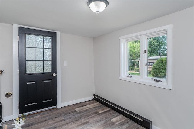 7 2nd Ave, Ware, MA 01082 - entryway featuring wood finished floors and a baseboard heating unit