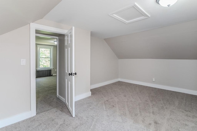 7 2nd Ave, Ware, MA 01082 - additional living space featuring radiator heating unit, carpet, attic access, and vaulted ceiling