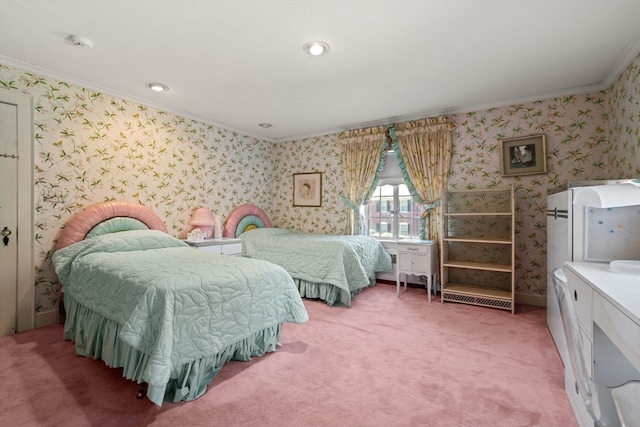 carpeted bedroom featuring crown molding