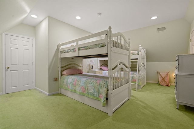 carpeted bedroom featuring vaulted ceiling