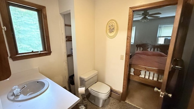 1755 Maple St, Dighton, MA 02764 - bathroom featuring ensuite bathroom, vanity, a ceiling fan, and baseboard heating