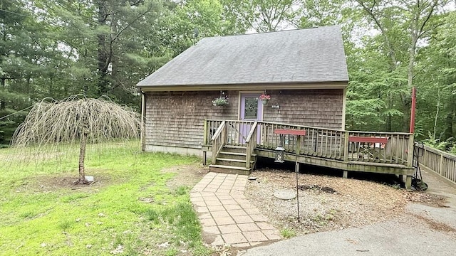 1755 Maple St, Dighton, MA 02764 - view of front of house featuring a deck and roof with shingles