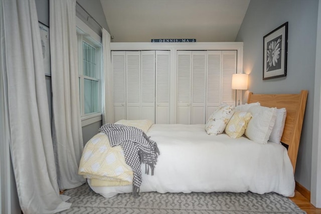 11 Cliff St, Dennis, MA 02638 - bedroom featuring two closets and vaulted ceiling