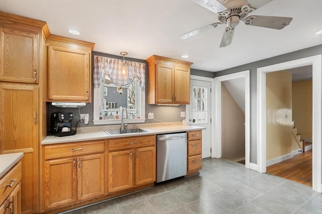 kitchen featuring decorative light fixtures, sink, dishwasher, and ceiling fan