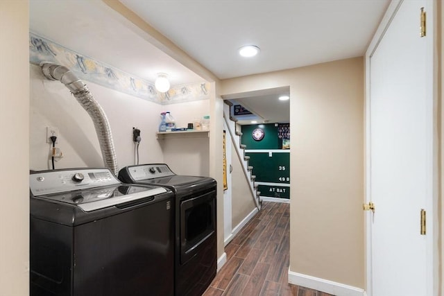 laundry room with washing machine and clothes dryer