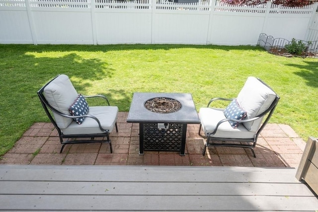 view of patio / terrace featuring a fire pit