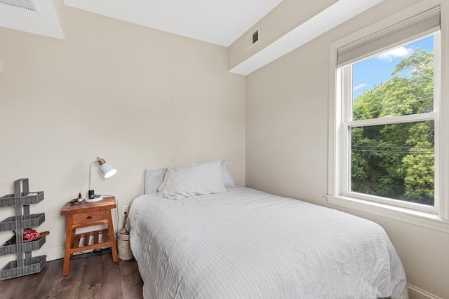 10 Elliott Pl Unit 3F, Peabody, MA 01960 - bedroom featuring dark wood-type flooring and baseboards