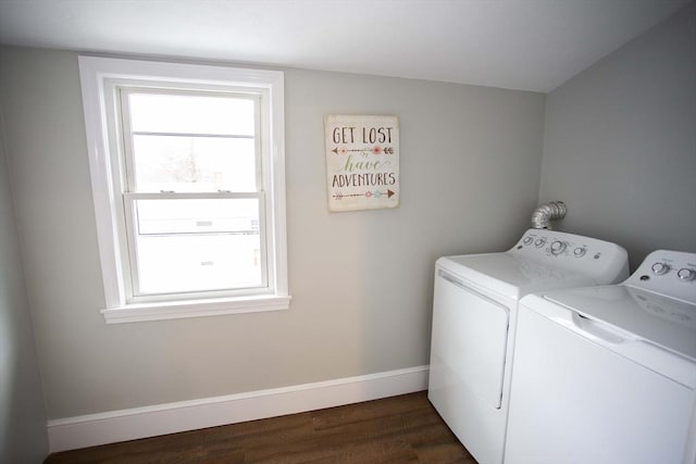 laundry room featuring laundry area, baseboards, dark wood-style flooring, and washer and dryer