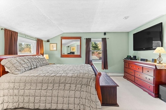 bedroom featuring a baseboard radiator, carpet flooring, a textured ceiling, and multiple windows