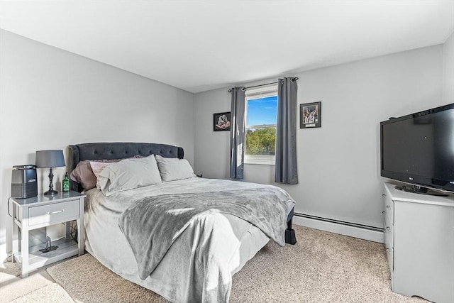 bedroom featuring baseboard heating and light colored carpet
