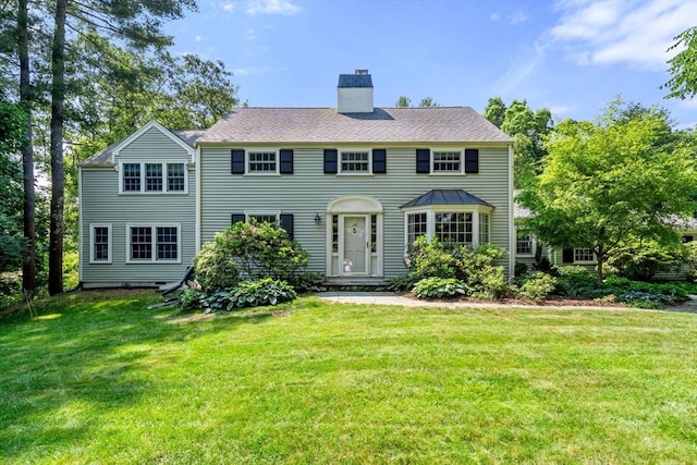 exterior space with a front lawn