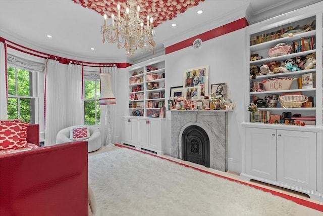 68 W Rutland Sq, Boston, MA 02118 - living room featuring crown molding, a chandelier, built in features, a fireplace, and recessed lighting