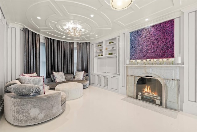 68 W Rutland Sq, Boston, MA 02118 - living area with built in features, a premium fireplace, coffered ceiling, a chandelier, and recessed lighting