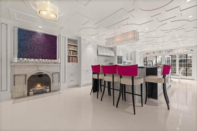 68 W Rutland Sq, Boston, MA 02118 - dining space featuring built in shelves and a fireplace