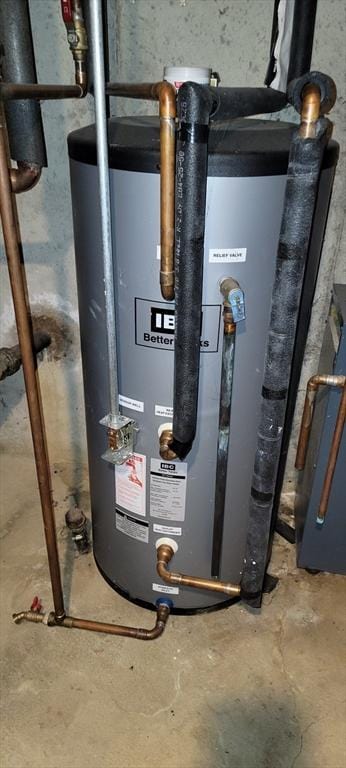 utility room with water heater