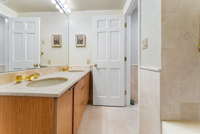 bathroom with tile patterned flooring and vanity