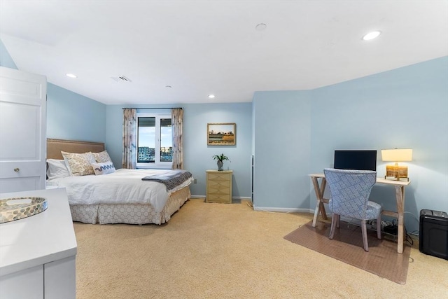 bedroom with light carpet