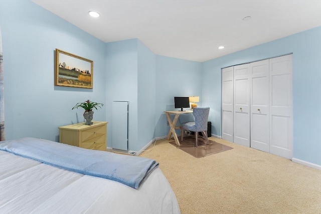 carpeted bedroom featuring a closet