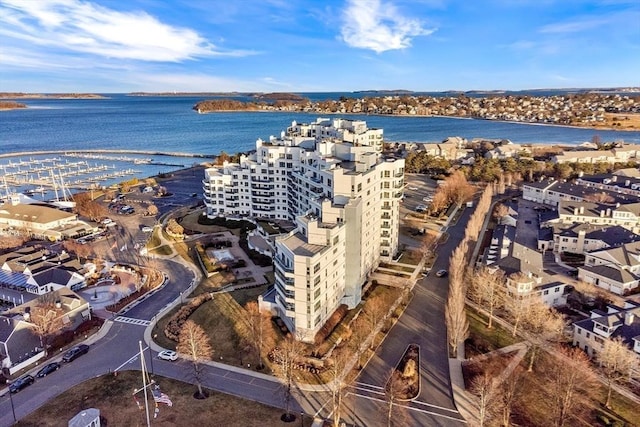 birds eye view of property featuring a water view