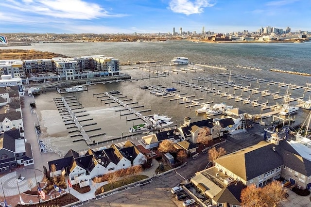 birds eye view of property featuring a water view