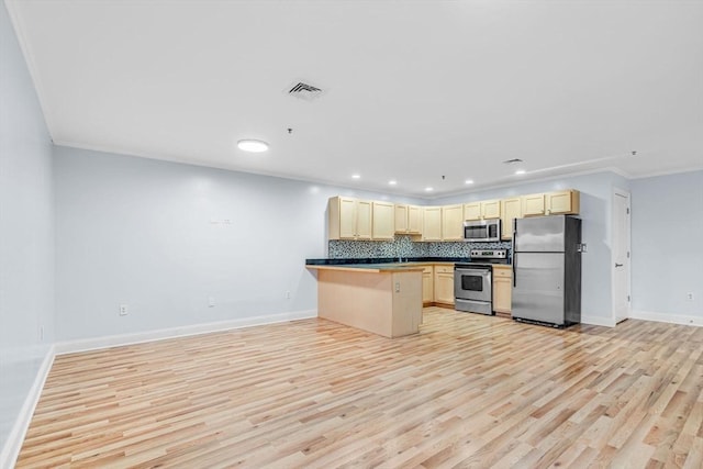 kitchen featuring light wood finished floors, visible vents, backsplash, a peninsula, and stainless steel appliances