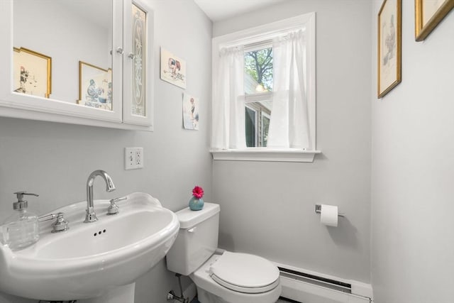 150 Academy St, Braintree, MA 02184 - bathroom with a baseboard heating unit, a sink, and toilet