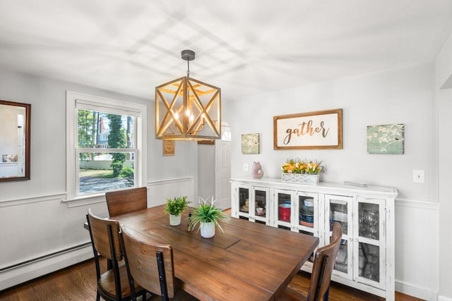 150 Academy St, Braintree, MA 02184 - dining room featuring a chandelier, a baseboard heating unit, and dark wood-type flooring
